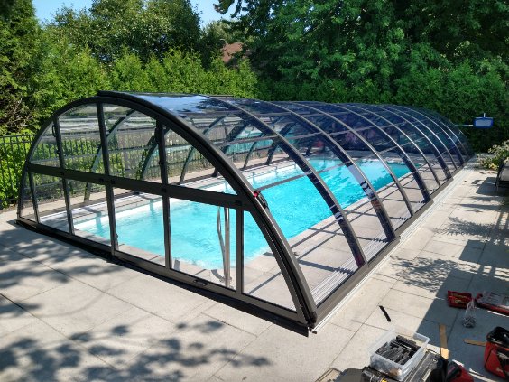 retractable pool enclosure on tracks